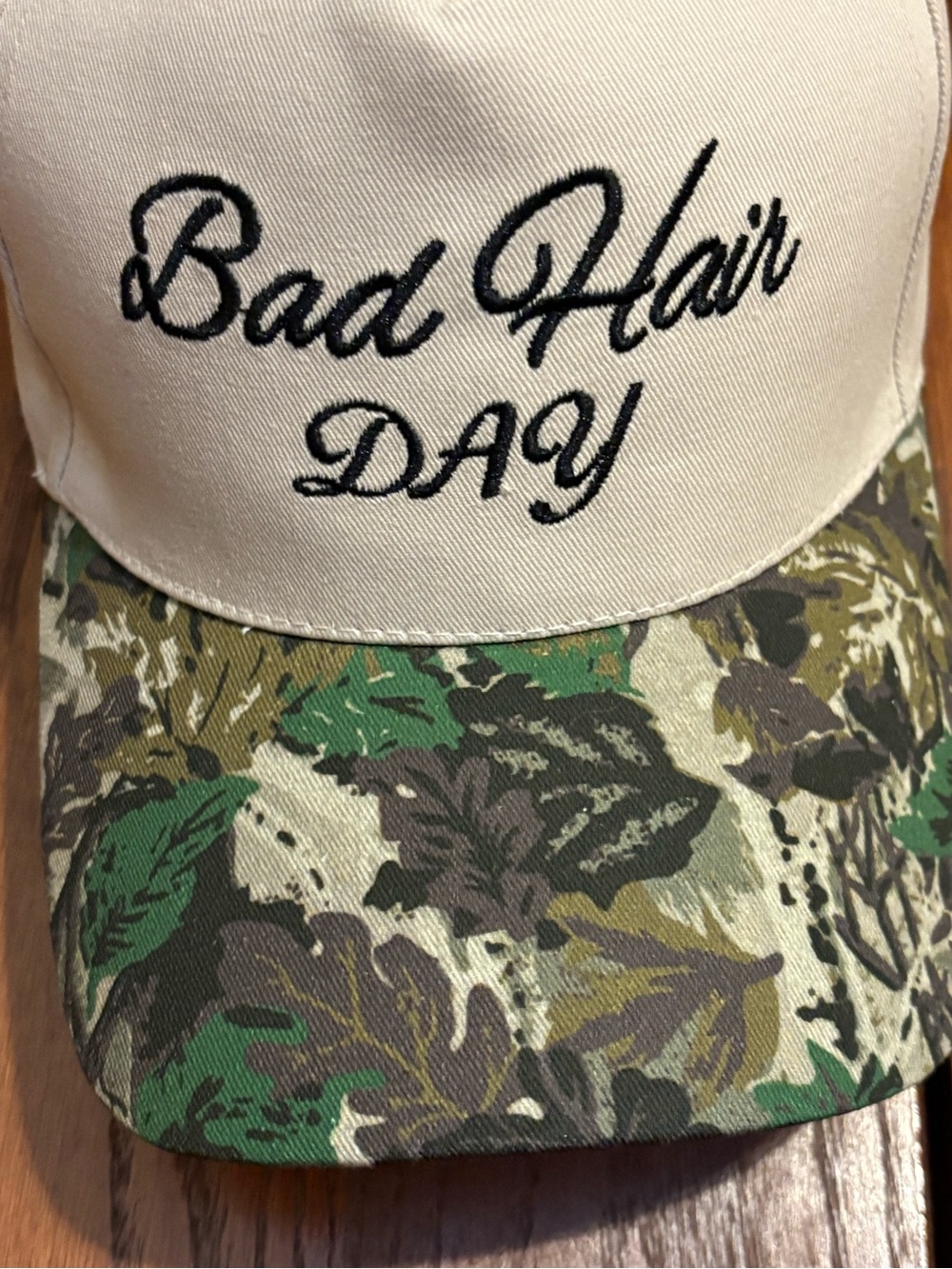 Bad Hair Day Men's Beige Trucker Hat with Green Camo Brim